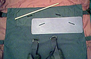 Outside view of pack showing plastic frame sheet, copper tube and shoulder straps.